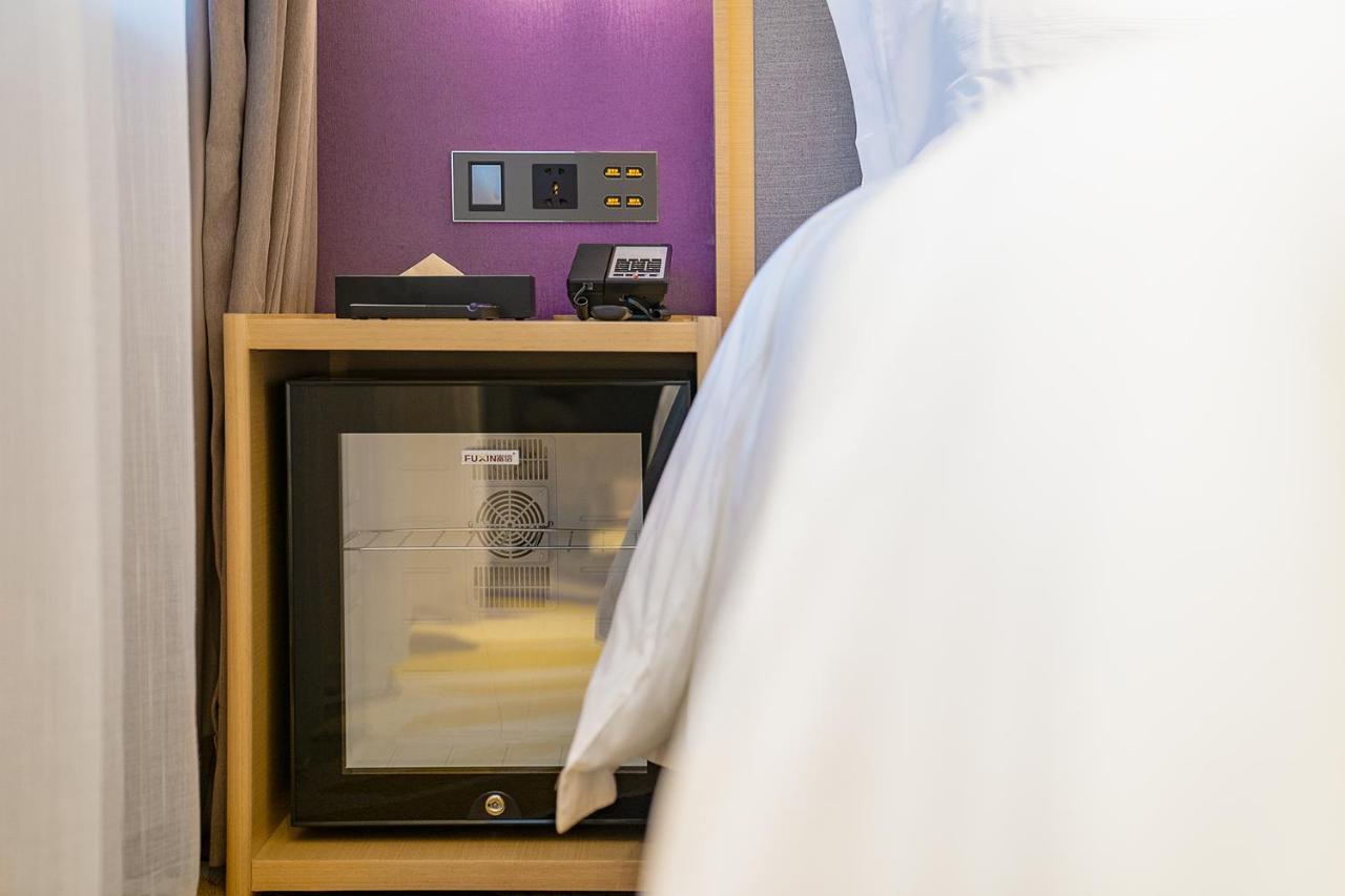 Echarm International Hotel Guangzhou Baiyun International Airport Huadu Plaza Branch - Free Deliver Service To Guangzhou Baiyun International Airport & Free Deliver Service To Canton Fair Complex During Canton Fair Period Buitenkant foto